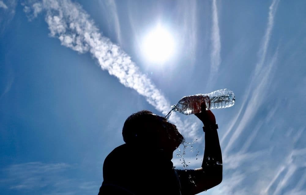 Schools to decide on hydration measures as heat rises, says Wong
