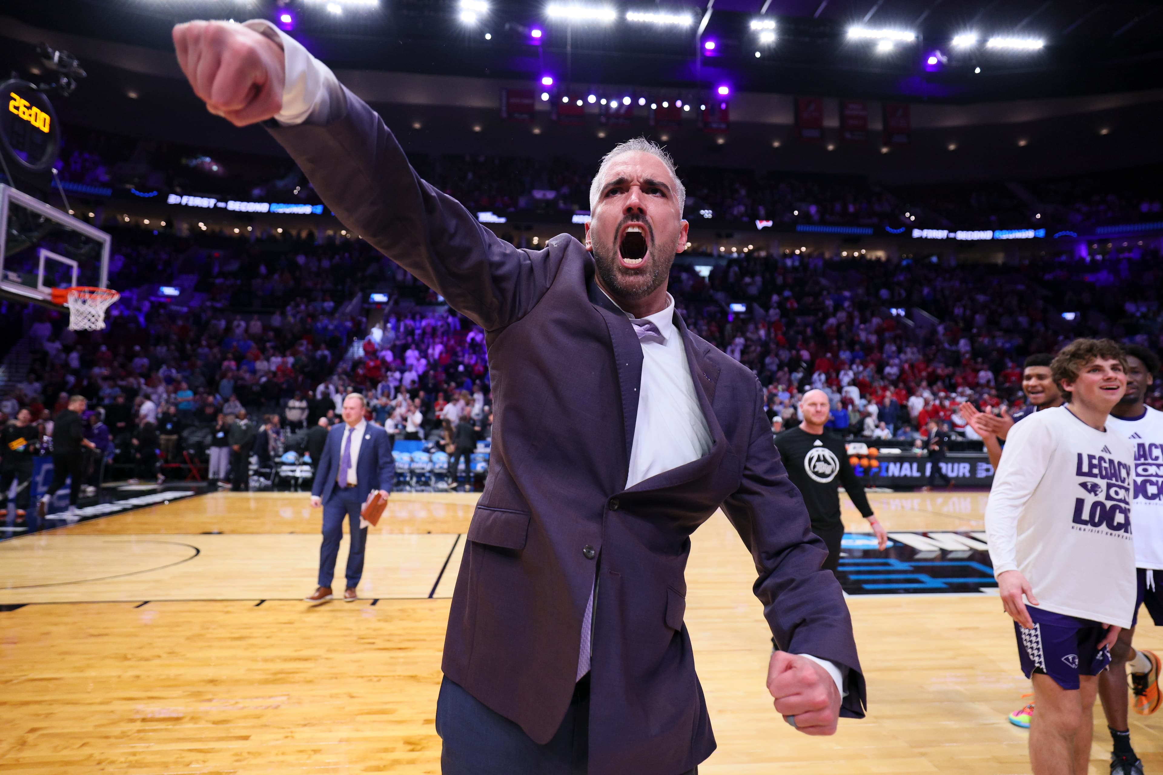 High Point coach Flynn Clayman rails against mid-major schedule disparity after NCAA tournament upset of Wisconsin: 'Nobody would play us'