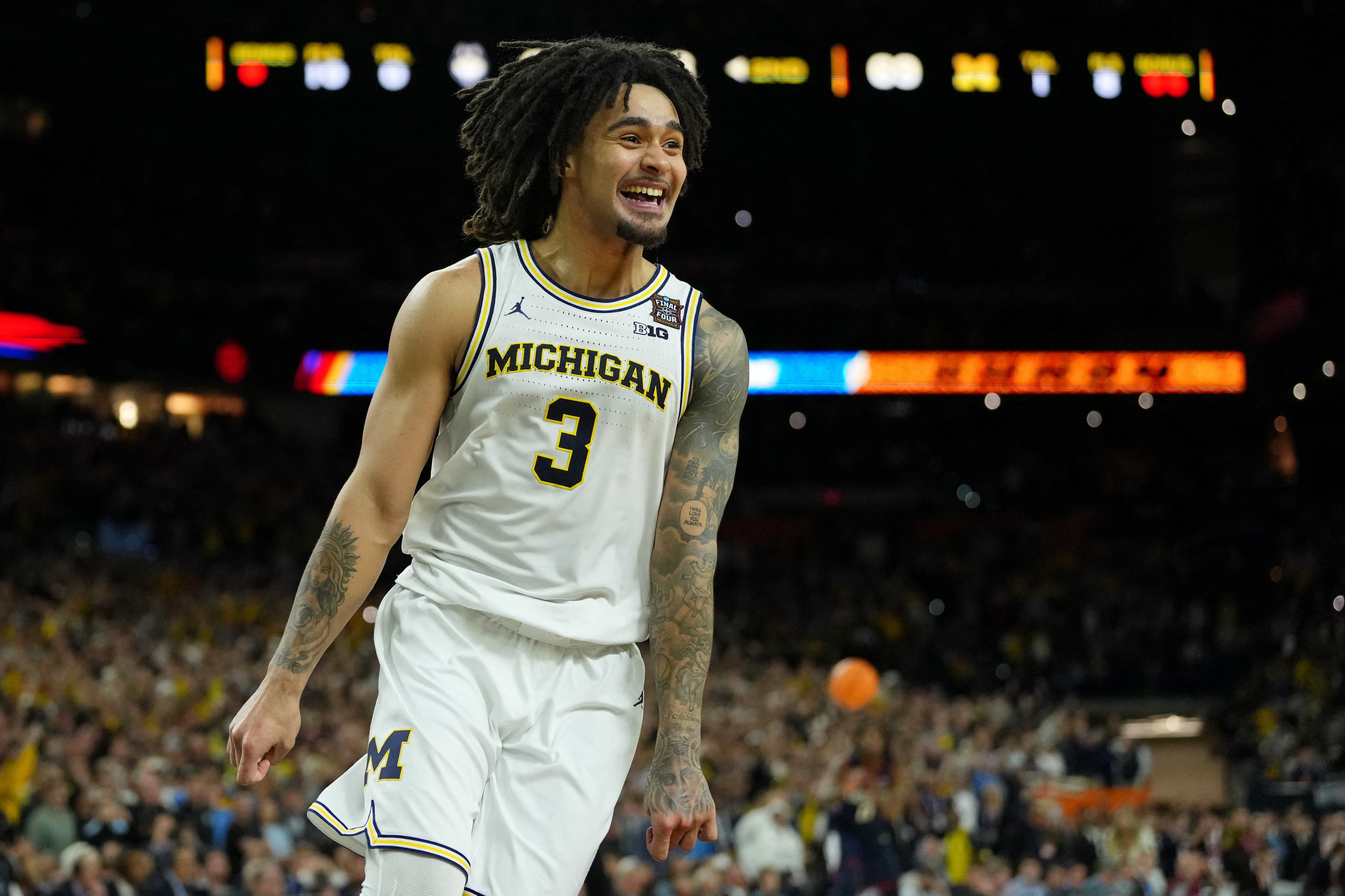 Way-too-early NCAA men's basketball Top 25 after Michigan's championship game win over UConn