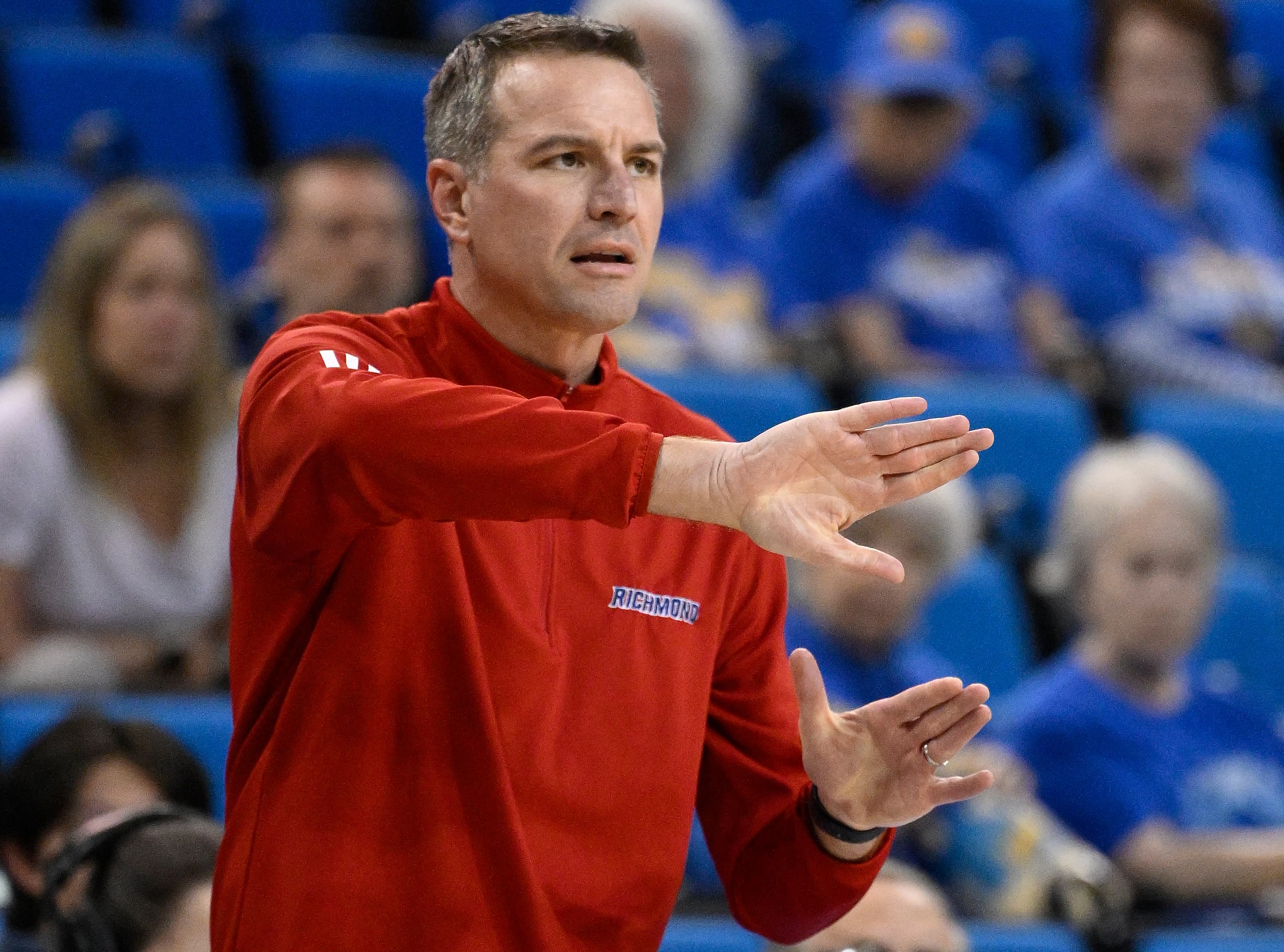 Virginia hires Richmond's Aaron Roussell after Amaka Agugua-Hamilton's firing, investigation