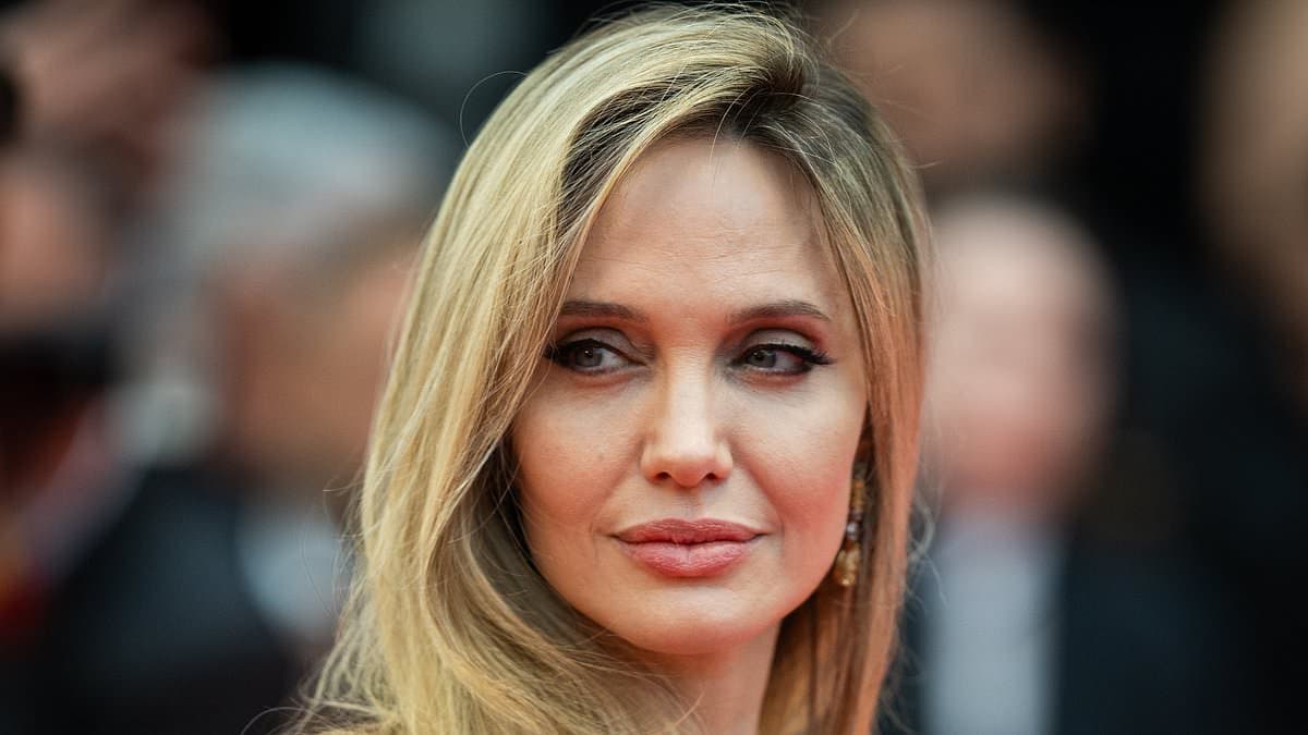 Angelina Jolie and George Clooney lead stars who have fled the US for France as Paris is dubbed 'Frollywood'