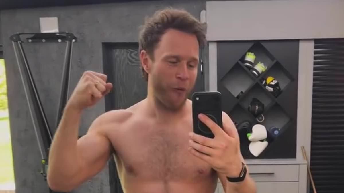 Olly Murs shows off his six-pack abs as he poses shirtless and gives a glimpse inside his lavish home gym