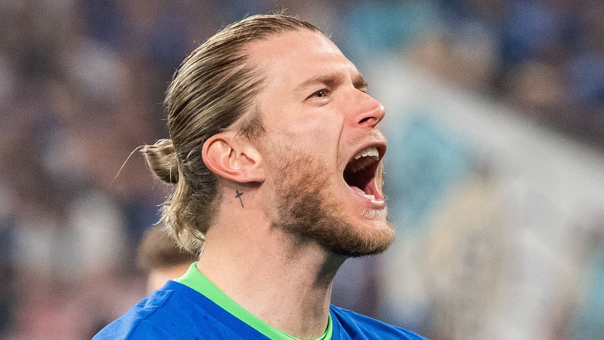 Ex-Liverpool flop celebrates promotion from second-tier as glamorous wife reveals he came close to QUITTING the game after Champions League nightmare