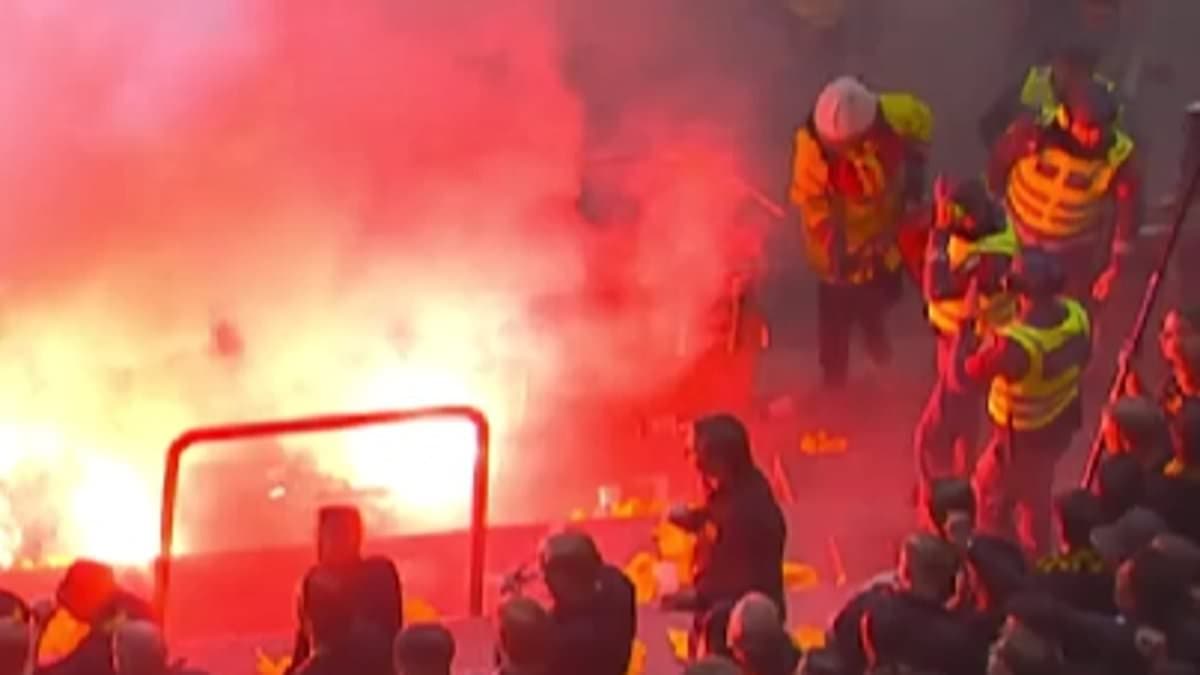 Fans evacuated from 50,000-seater football stadium as FIRE breaks out during top-flight European game