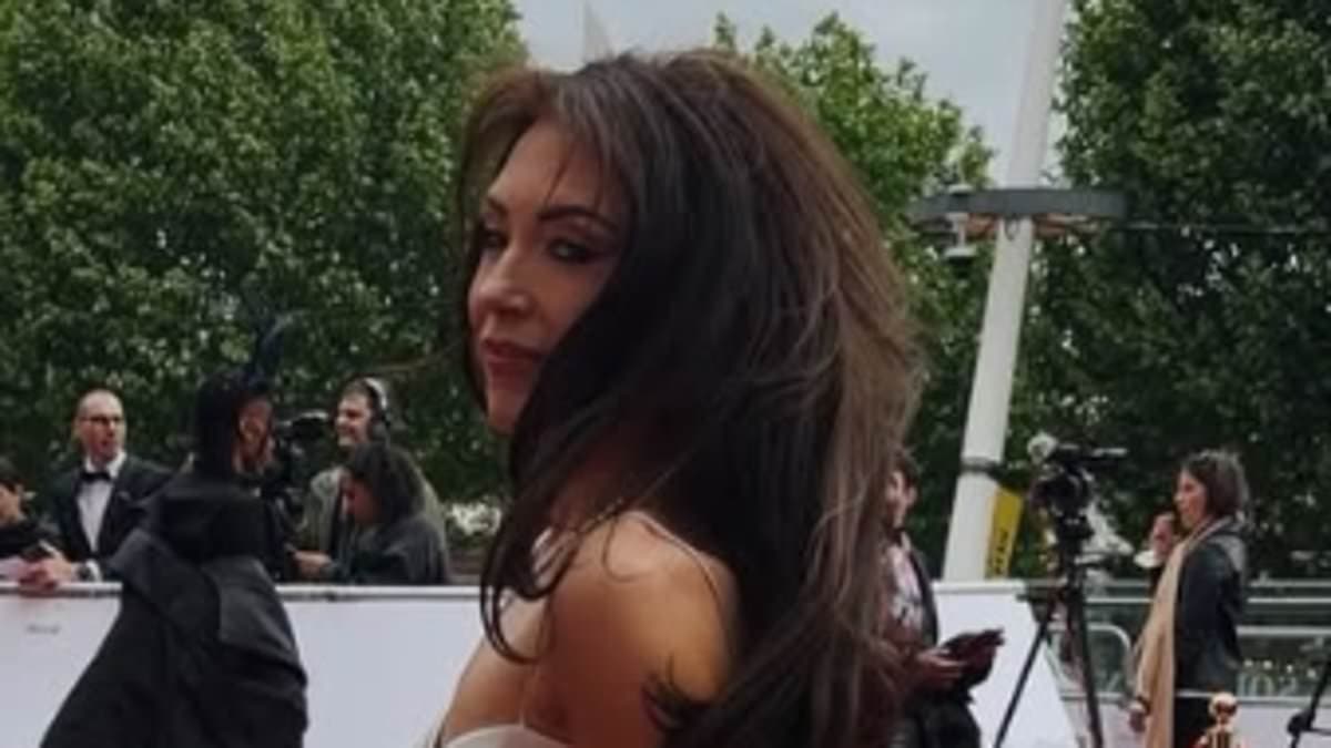 Lorna Luxe rewears her wedding gown to the BAFTA TV Awards three months after her beloved husband John's death: 'I think he'd be proud'