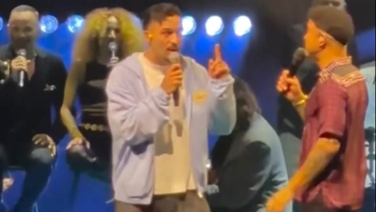 AFL star stuns footy fans with his secret talent during a Guy Sebastian concert
