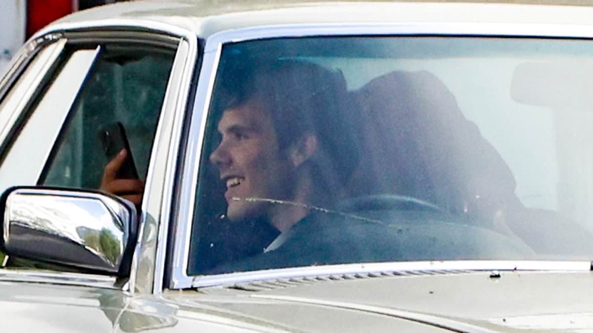 Cruz Beckham looks thrilled to be back behind the wheel of his vintage Mercedes six months after losing his licence over two speeding tickets