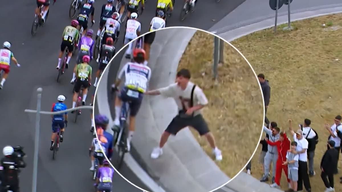 Moment two men 'try to push cyclists and cause a crash during Giro d'Italia for social media challenge'