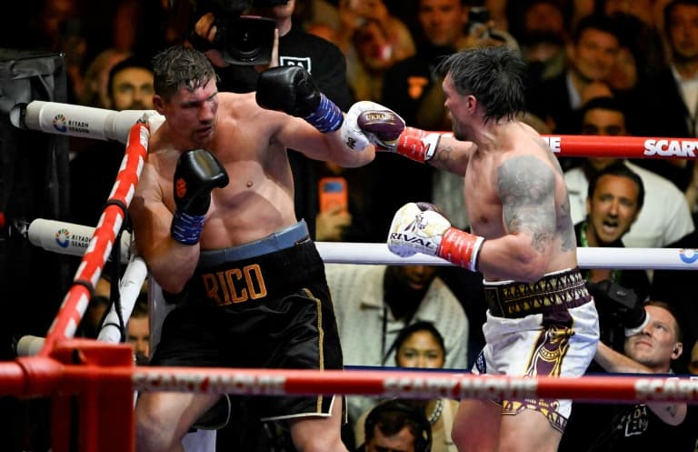 Usyk rocked before stopping Verhoeven to retain heavyweight belts