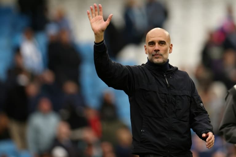 Guardiola says Man City 'still fighting' for Premier League title