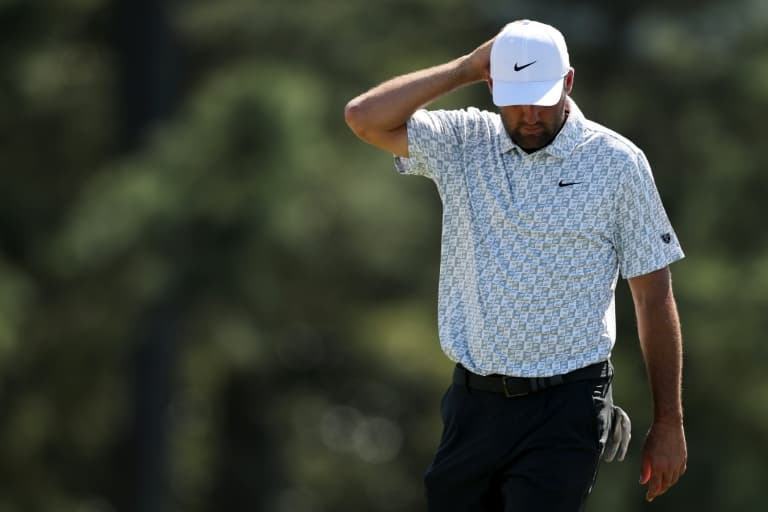 Frustrated Scheffler finds water hazards at Masters
