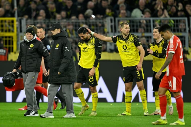 Dortmund extend injured captain Can's contract