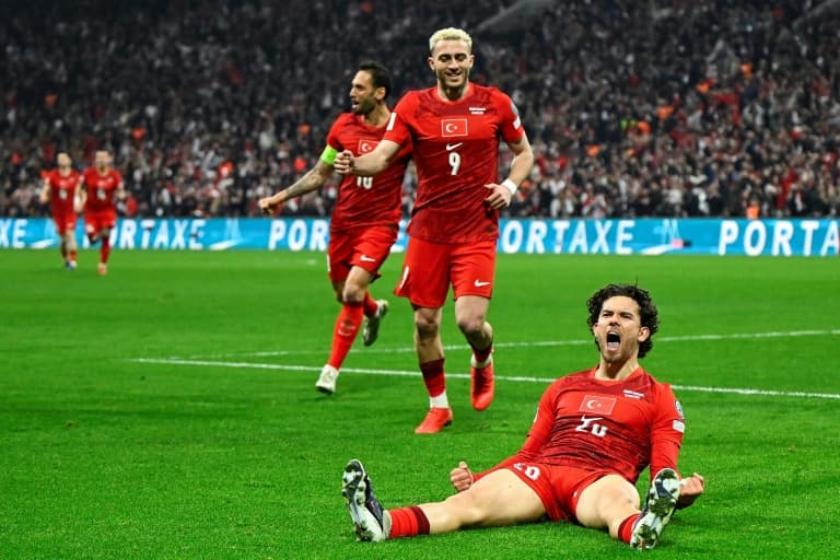 Kadioglu fires Turkey past Romania, to brink of World Cup