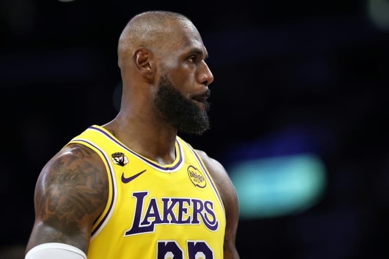 James breaks NBA appearance record as Lakers win thriller