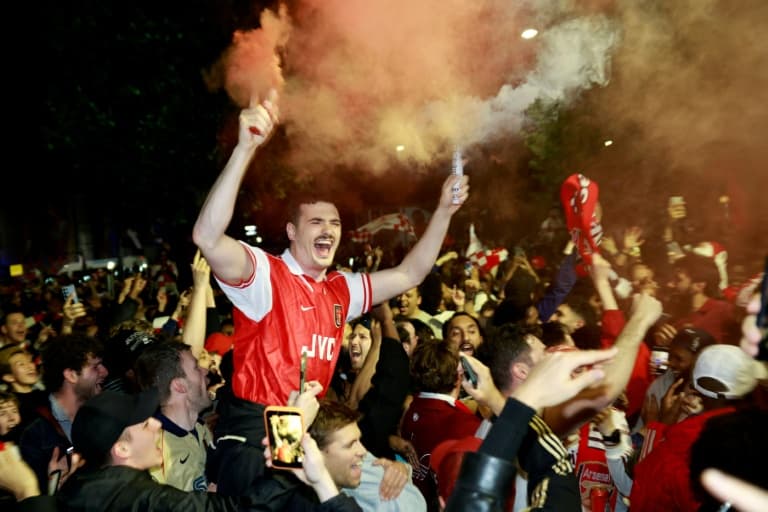 Arsenal players in dawn celebrations after winning Premier League