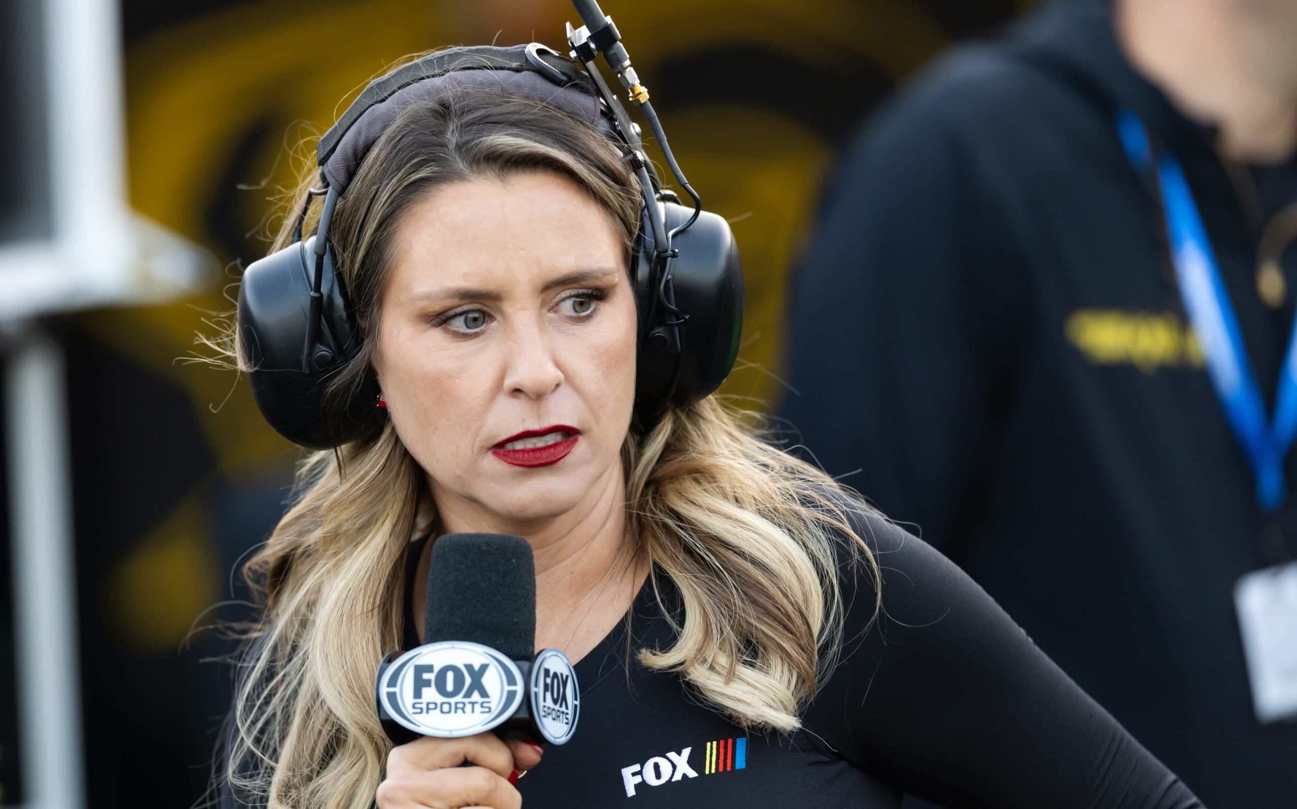 NASCAR pit crew member shields Fox reporter Amanda Busick from 4,000-pound runaway cart