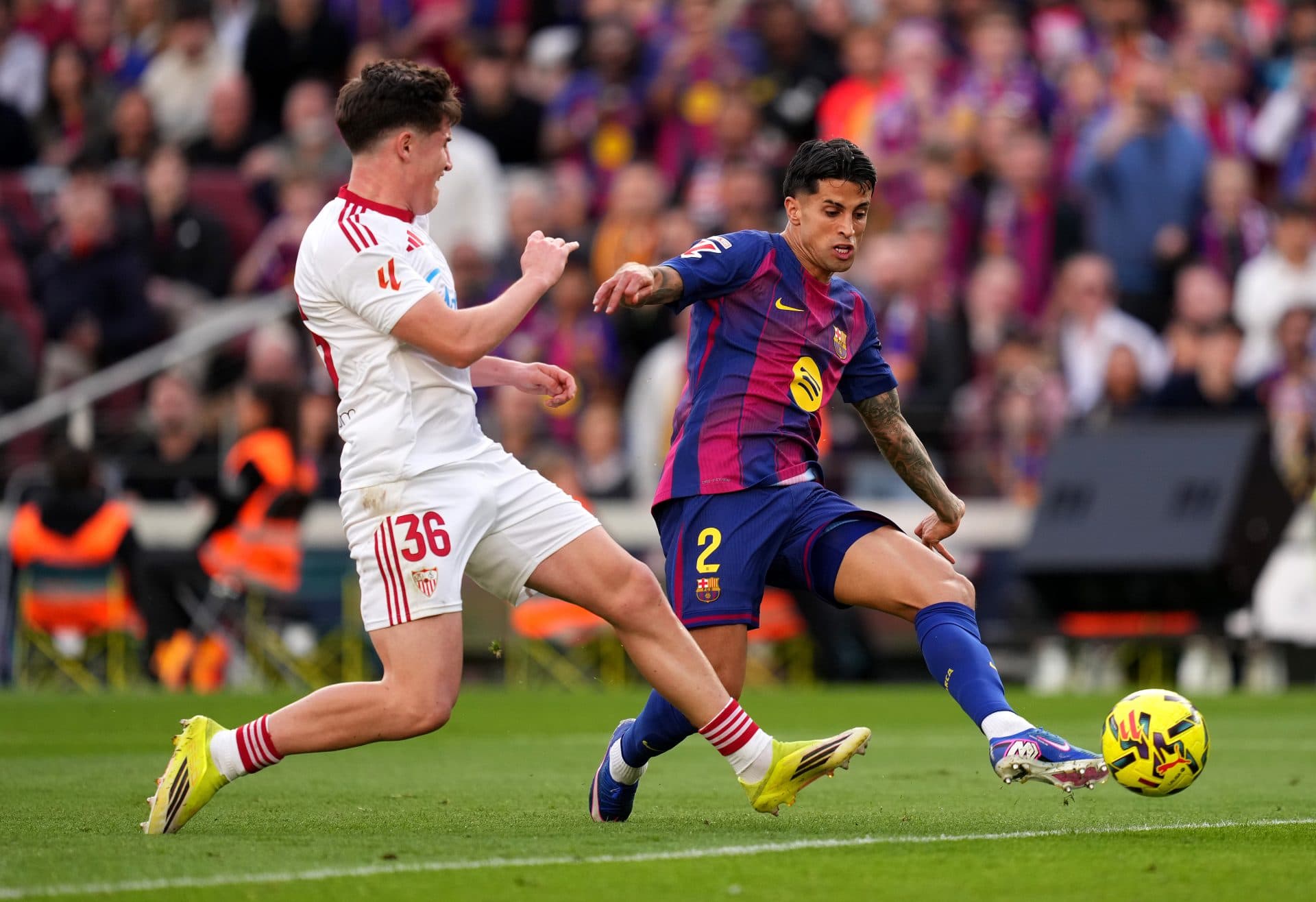 New Headline: "Sevilla's Flick Puts Youngers at Center of Backline for Champions League Run