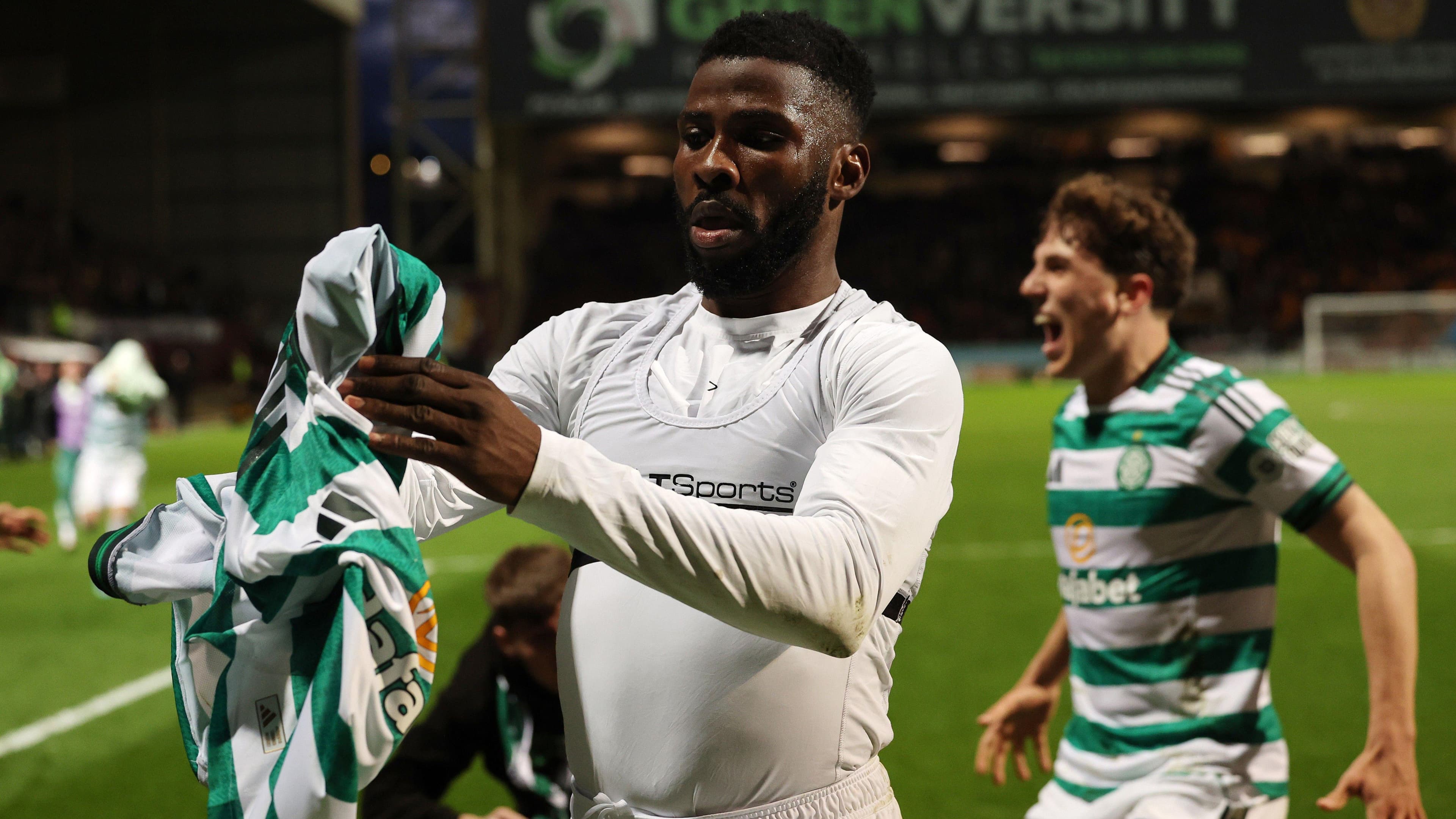 Controversial 99th-minute penalty keeps Celtic's title hopes alive