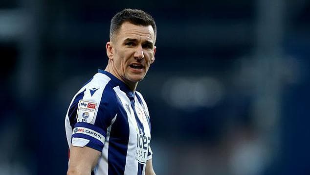 Captain Wallace setting the standard for Albion