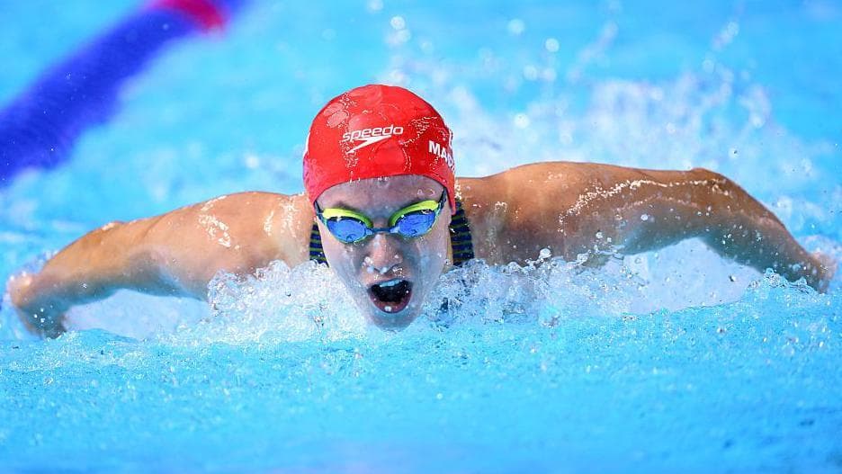 Macinnes retains British title as six secure Commonwealth times