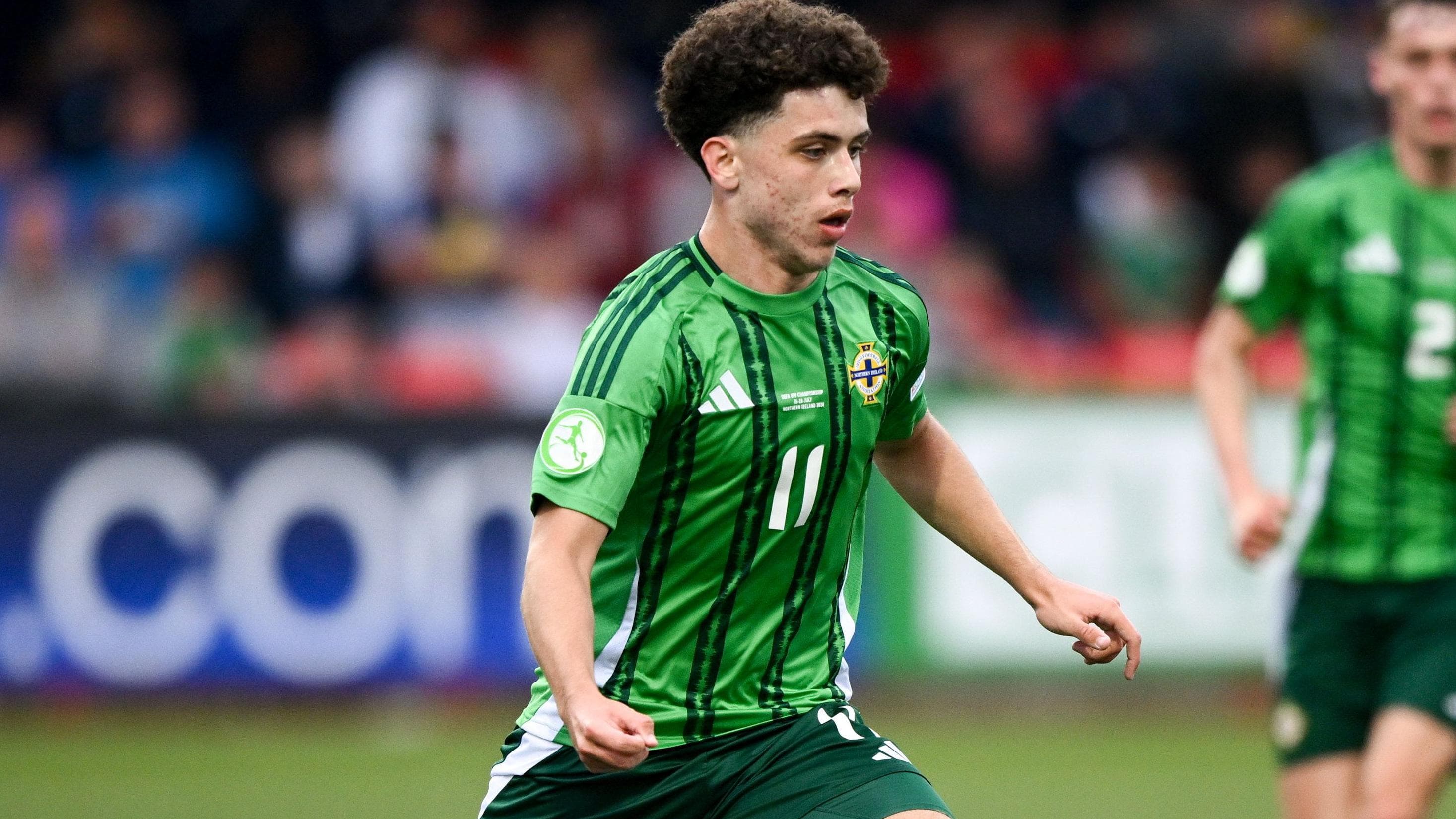 New Headline: "Renowned Northern Ireland Driver Makes Stellar Start in Grand Prix!