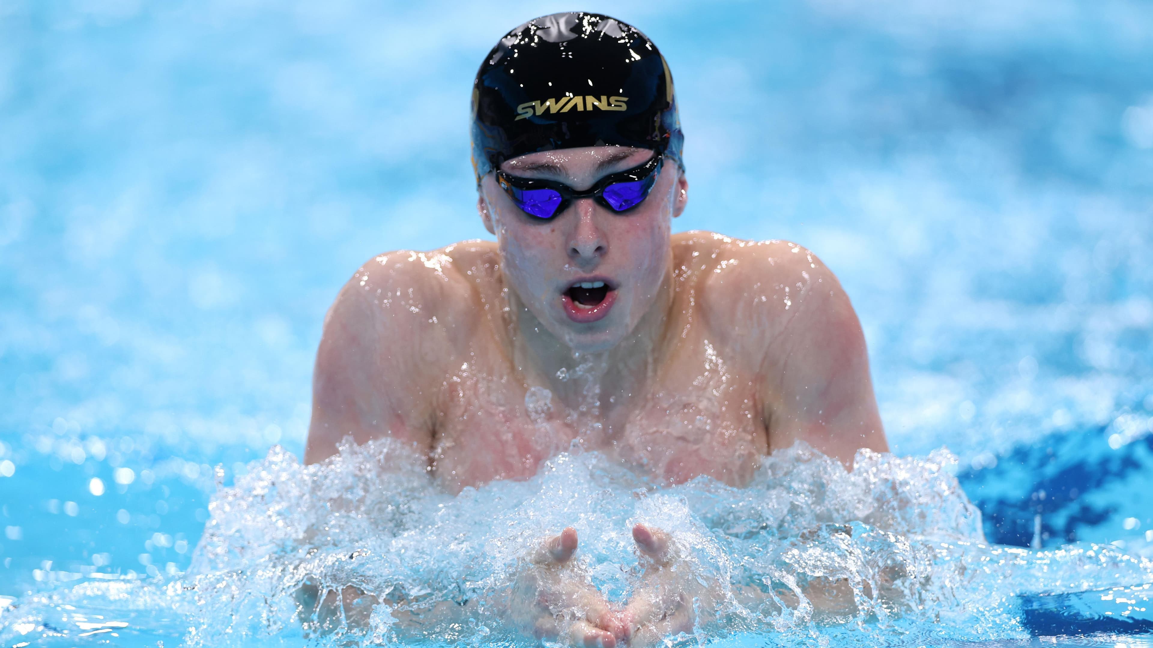 Nowacki wins first senior British swimming title