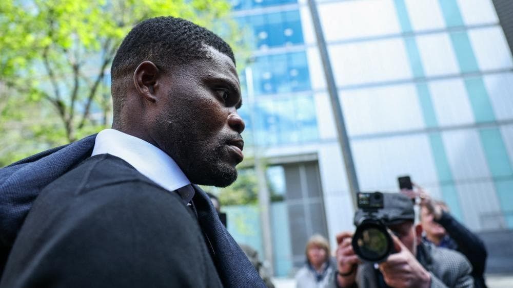 Former Arsenal player denies two new counts of rape