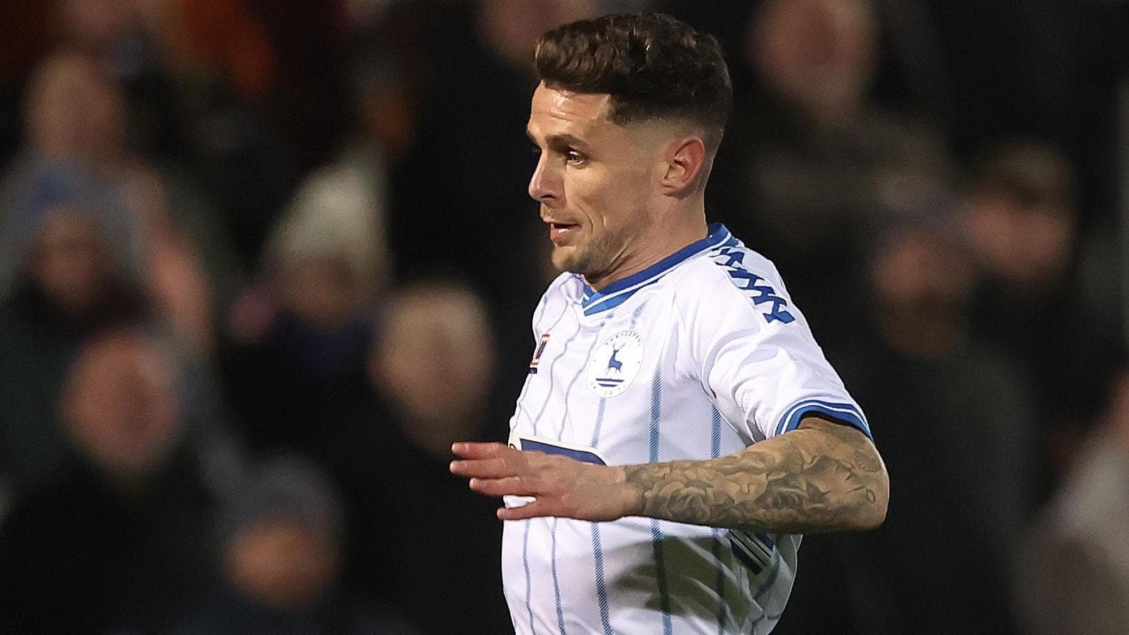 Boston sign midfielder Holohan
