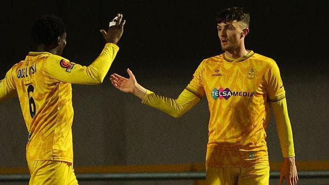 Sutton defender Kirk extends deal despite injury