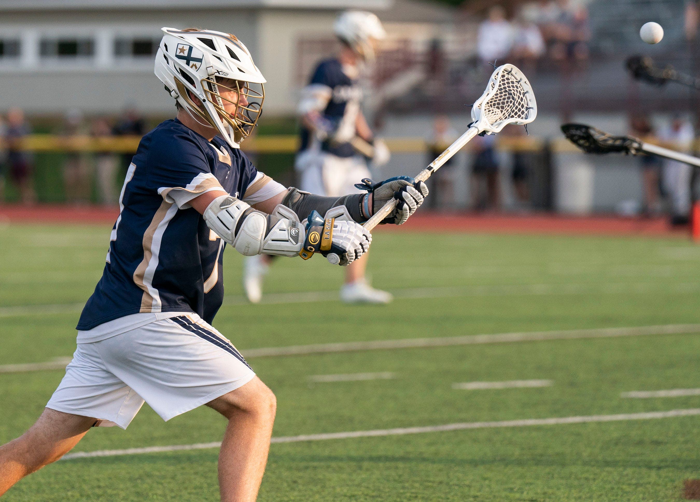 Who is the top returning boys lacrosse player in the Bucks County area?