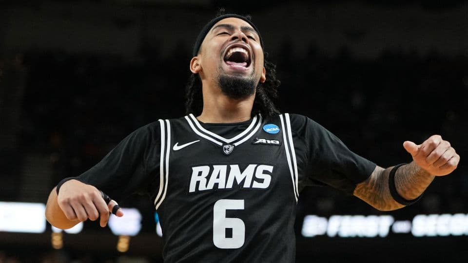 Upsets and Duke surviving a tough challenge marked the first day of March Madness. Here are the biggest moments from Thursday