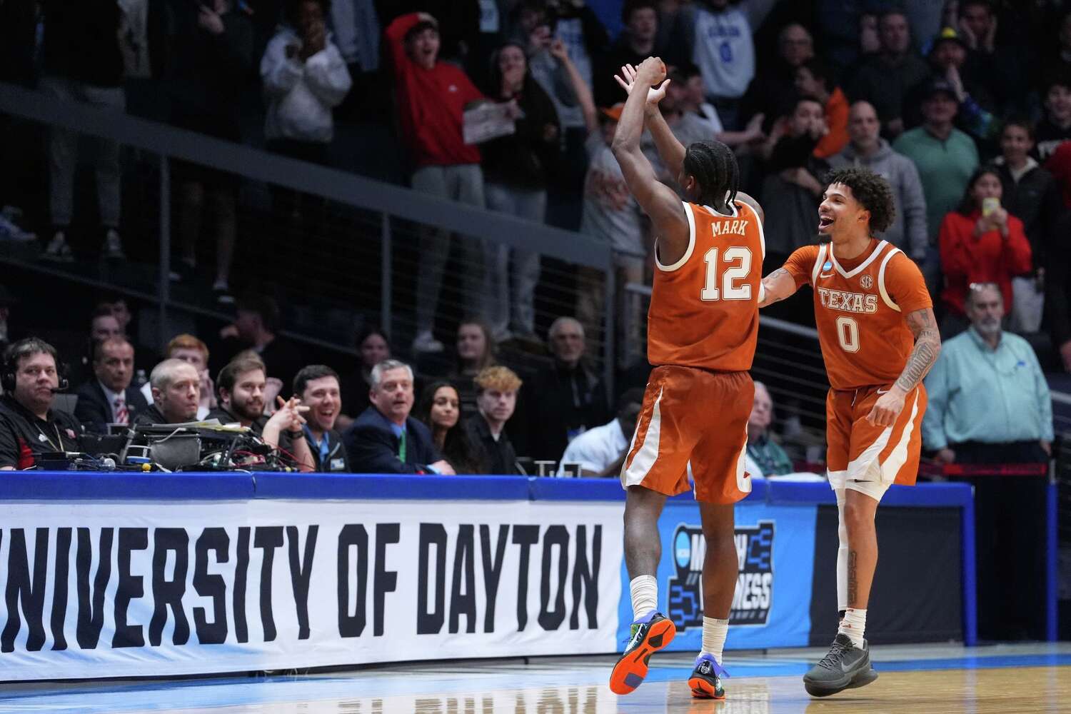 Mark Burns Lights Up College Basketball Stage for NC State's Thriving Showdown Against Texas!