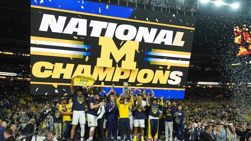 Michigan muscles its way to program’s 2nd national title, beating stubborn UConn 69-63