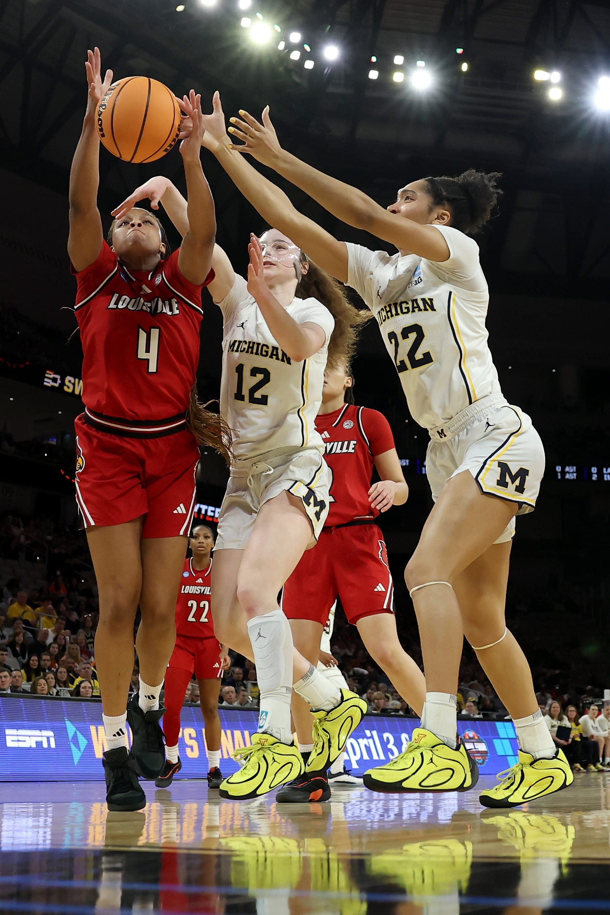 Michigan women rout Louisville, need one more win to reach Final Four