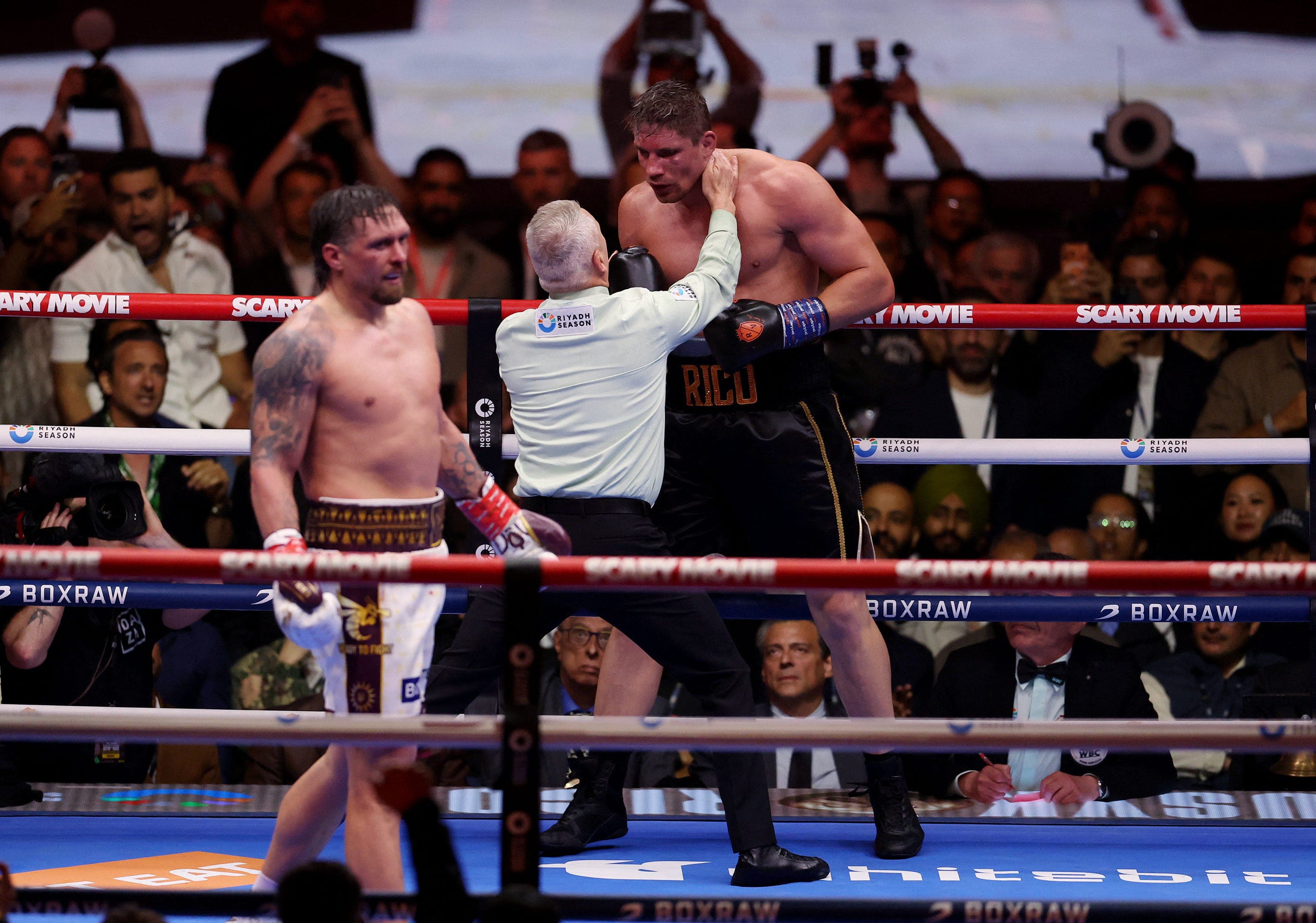 Usyk avoids shock with 11th round stoppage of Verhoeven