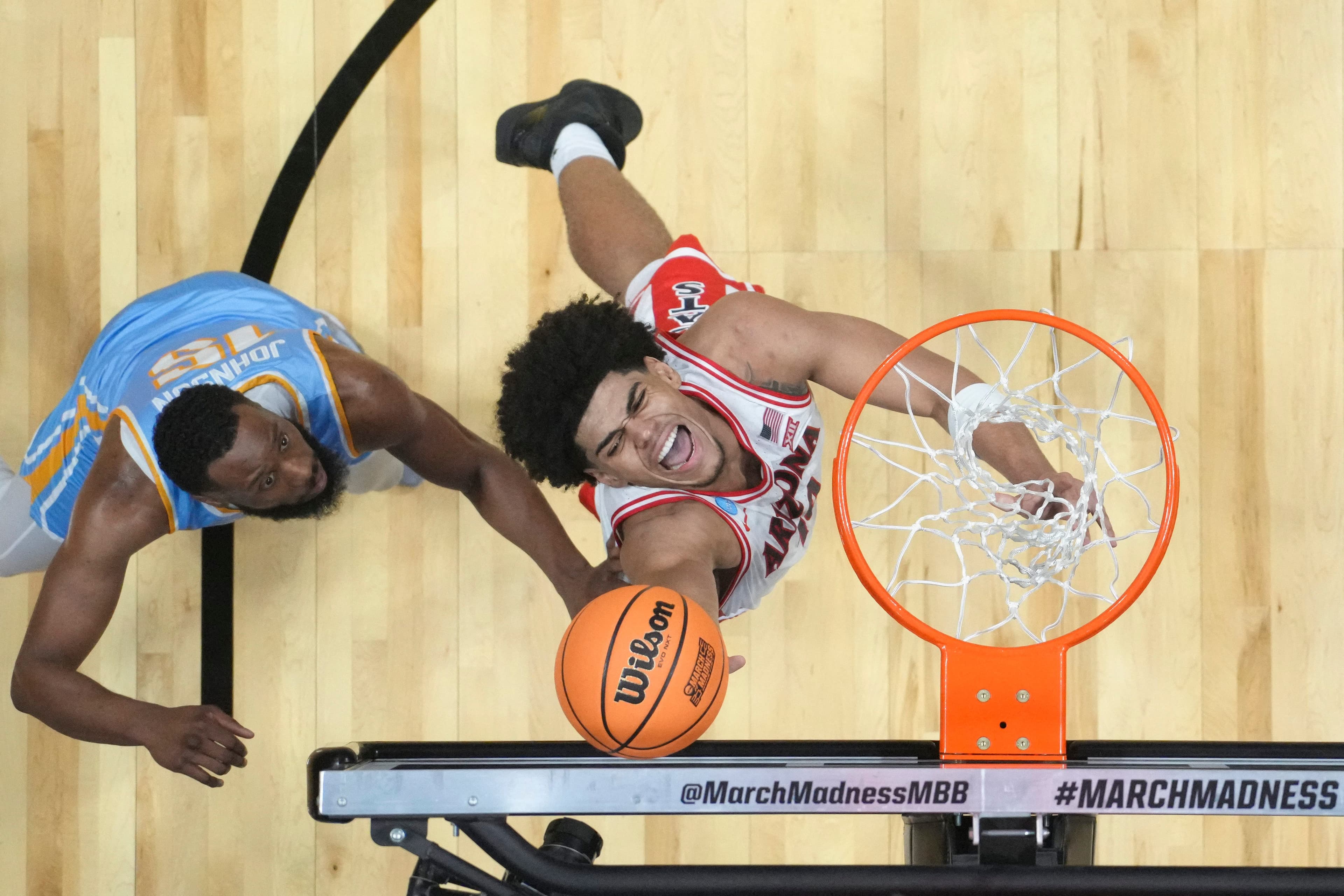 NCAA Tournament roundup: Top-seeded Arizona opens with win over Long Island