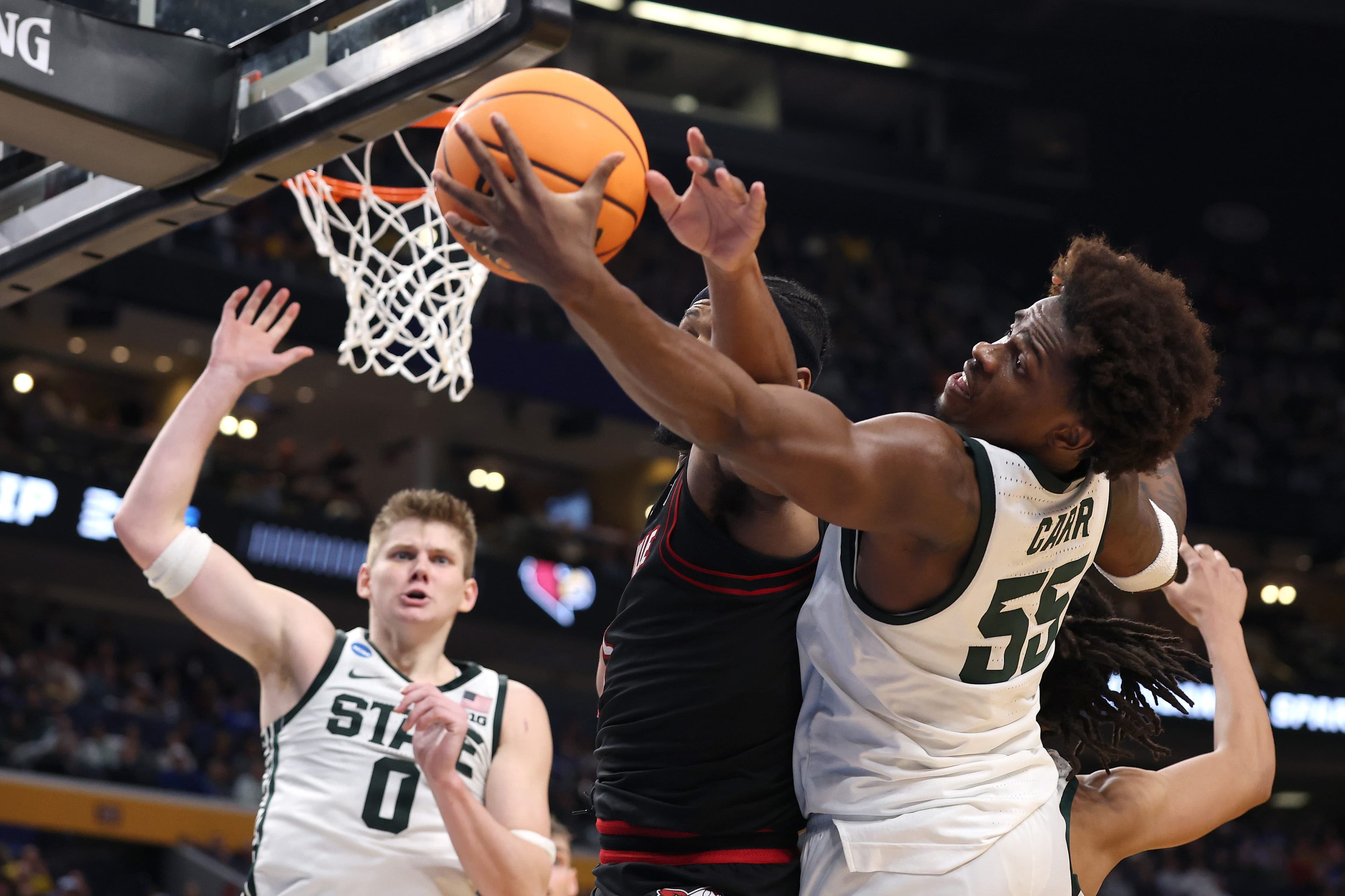 Michigan State turns back Louisville to dance into NCAA Tournament Sweet 16