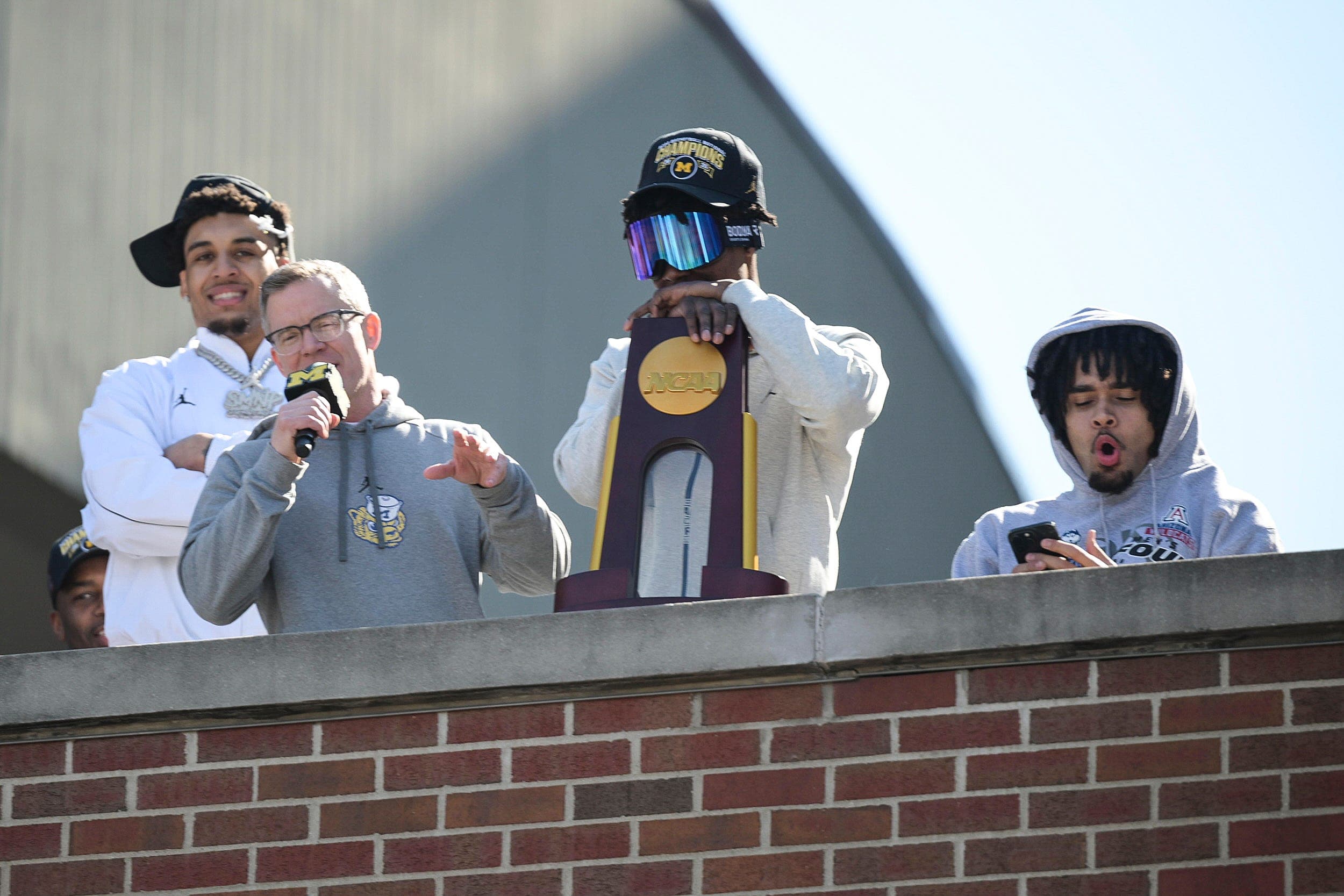 Hundreds gather to welcome back UM team after clinching NCAA title