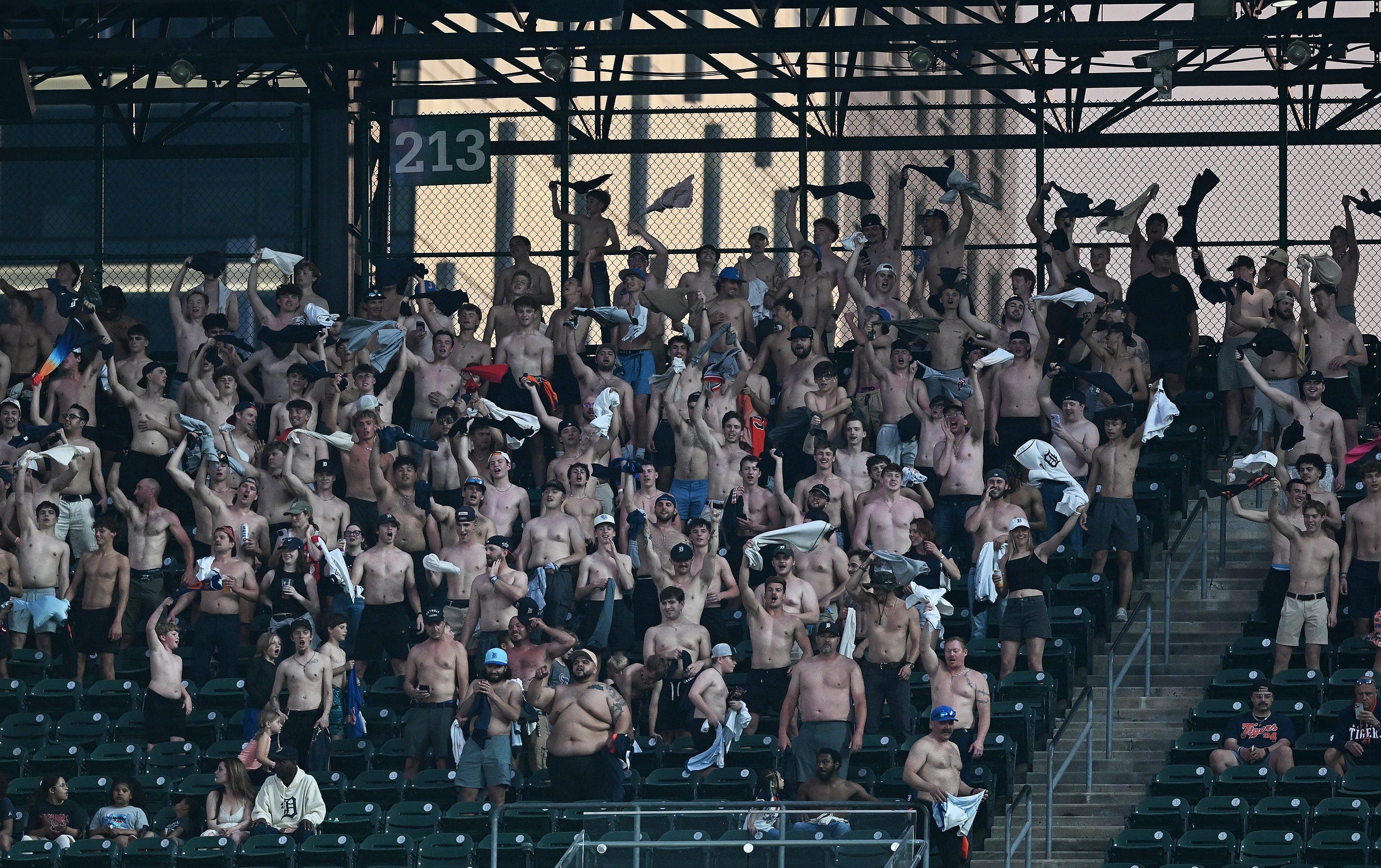 Tigers fans ditch shirts as 'Tarps Off' takes over Comerica Park