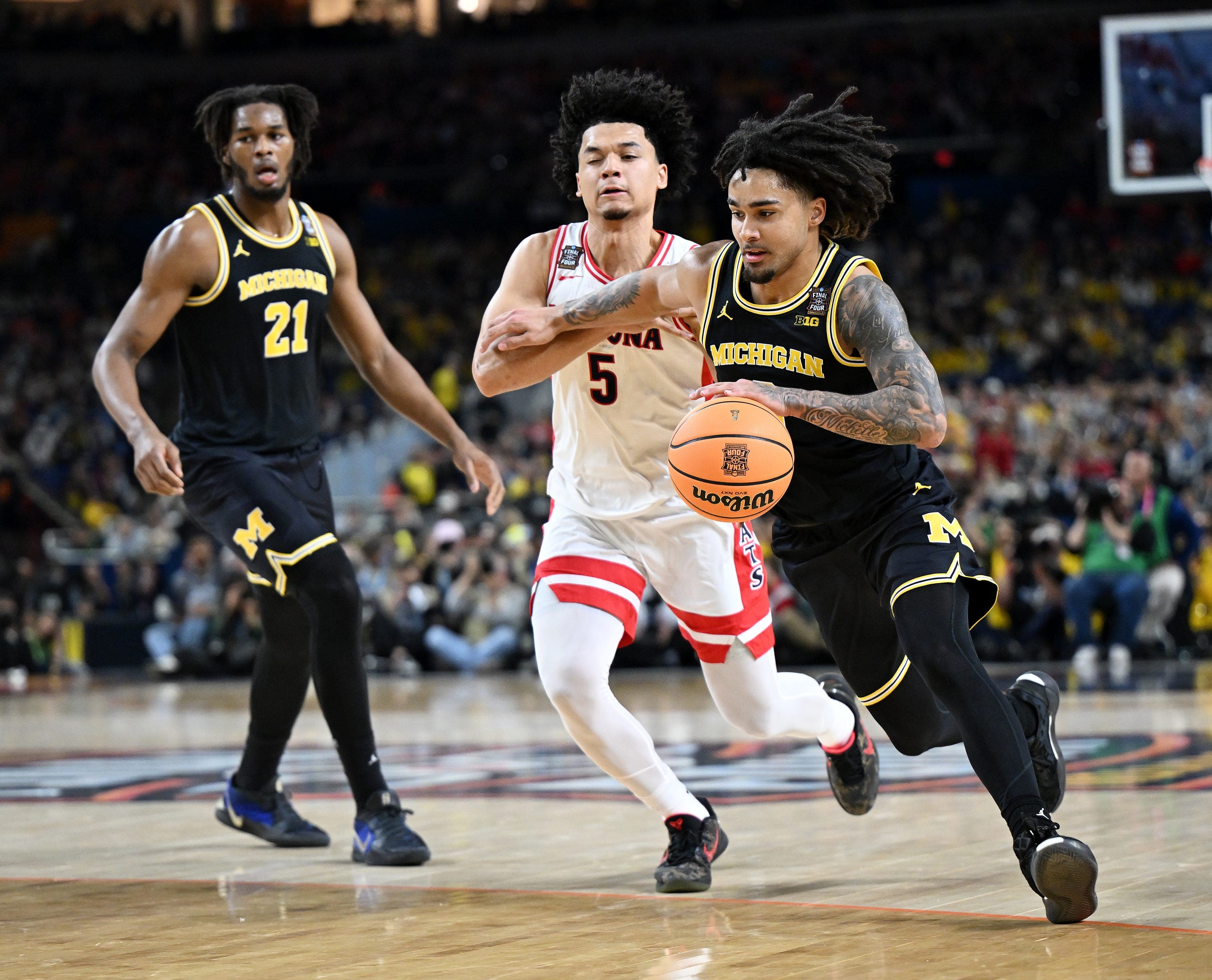 Michigan will play for national championship after leaving Arizona in the dust