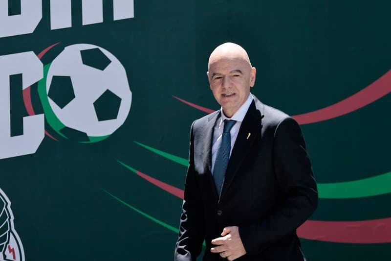 Infantino: Iran 'will play in World Cup'; new Iran team protest