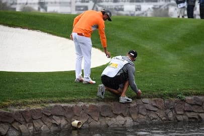 Rules of Golf Review: I carefully tried to pick up a rake but I accidentally moved my ball. Is that a penalty?