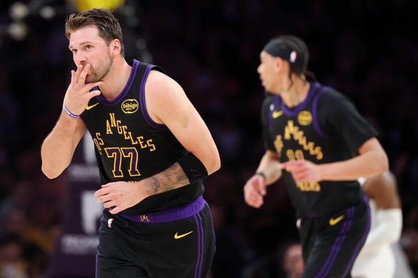 Luka Doncic scores 42, reaches milestone and leads Lakers to 13th win in 14 games