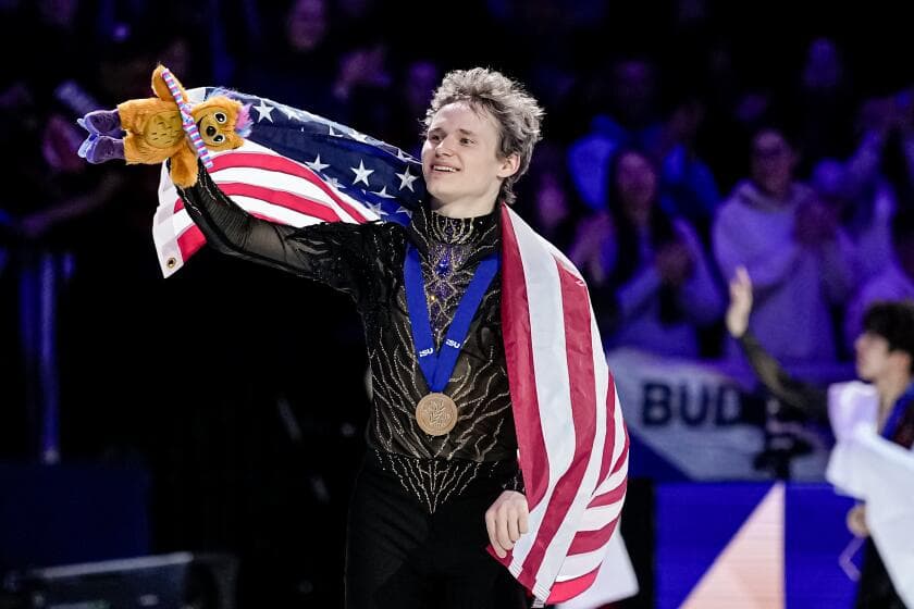 Ilia Malinin bounces back from Olympic nightmare to win third straight world figure skating title