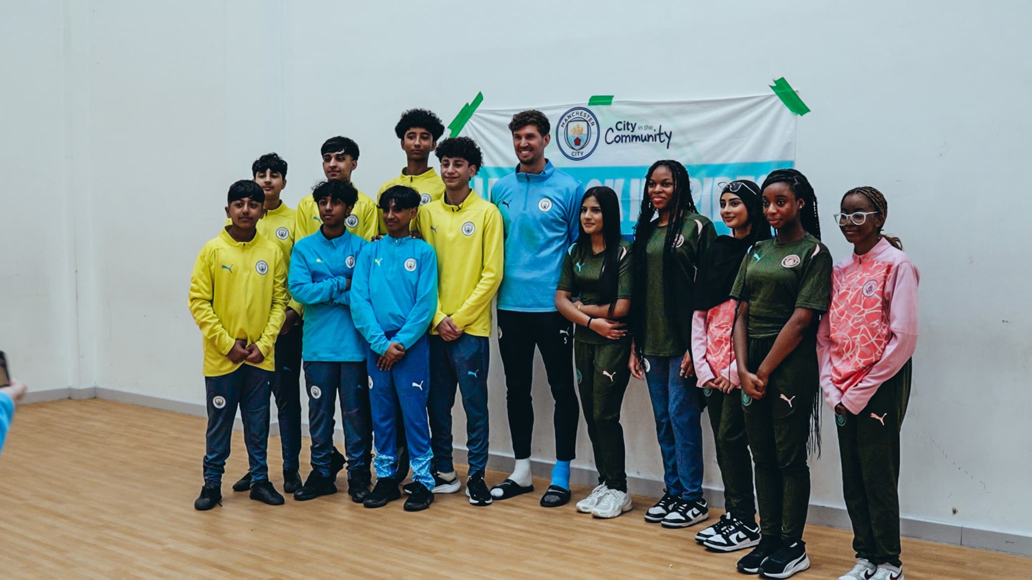 John Stones makes undercover visit to City in the Community session
