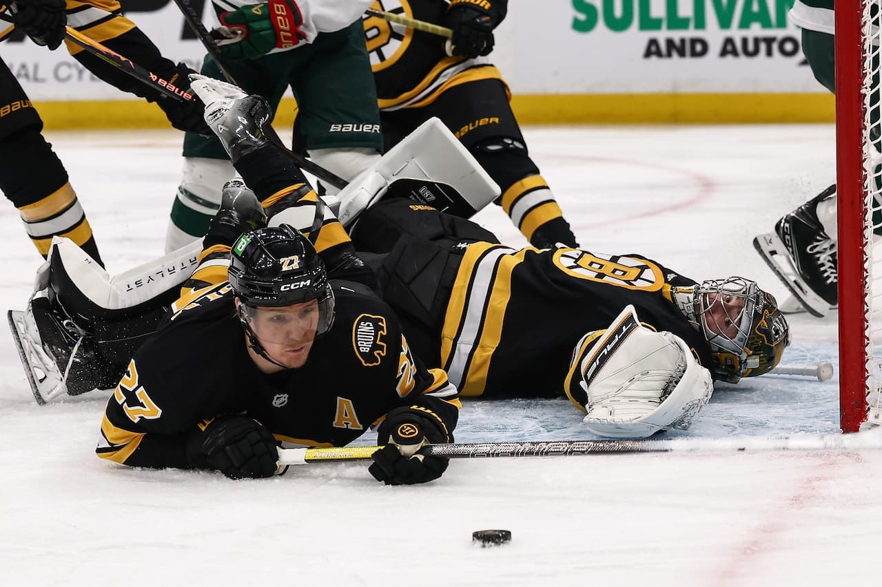 Pavel Zacha scores twice as Bruins hang on late for a huge win over Wild