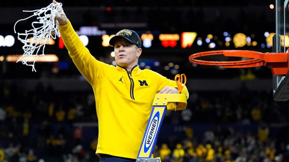 Back in Ann Arbor, Dusty May tells jubilant Michigan fans: ‘This trophy is yours’