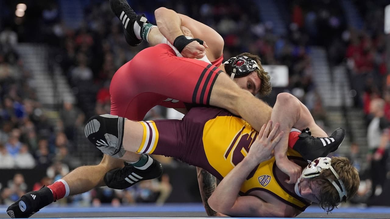 New Headline: Powerhouse Michigan's 450-Pound Forward Leads Charge to NCAA Title Chance
