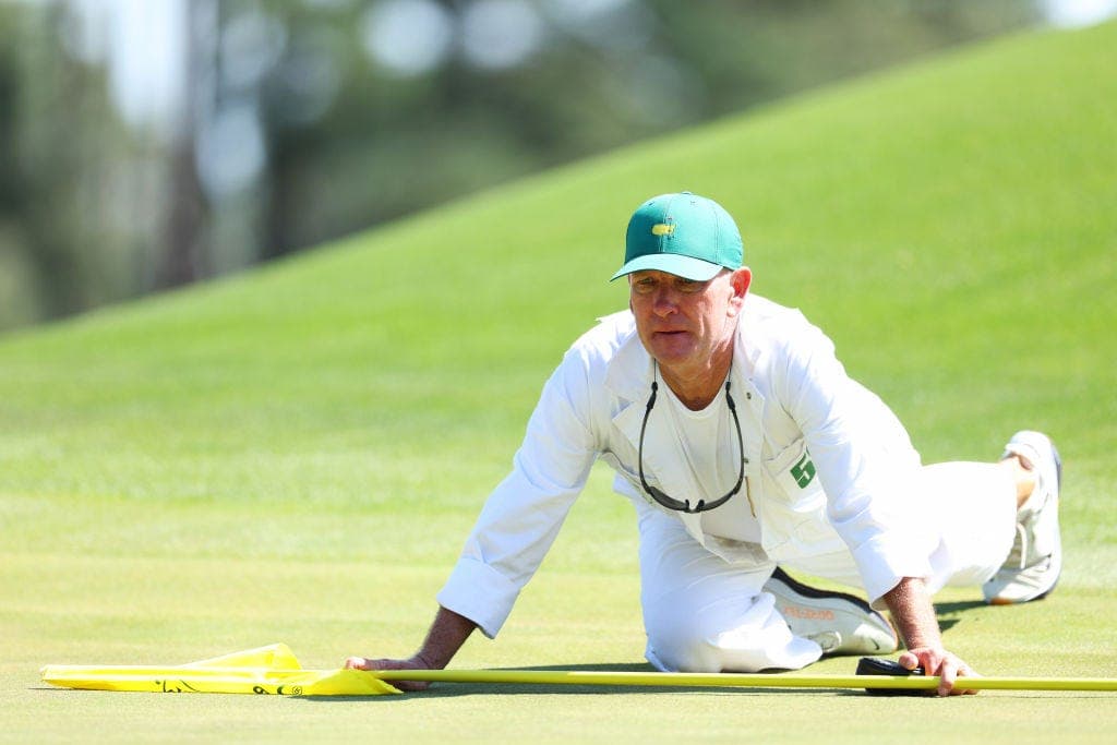 Why do Masters caddies wear white jumpsuits? When did tradition begin?