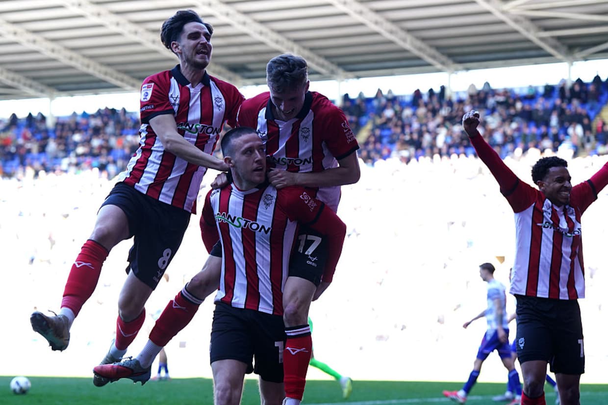 Lincoln City earn historic promotion to the Championship